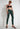 PANTALONE-JEANS SPALMATO - Grün